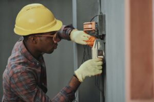 Man installing Electrical cable